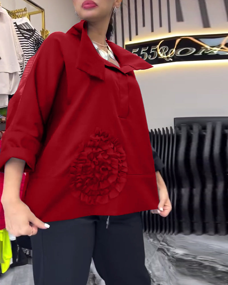 Camicetta floreale patchwork con risvolti in pizzo