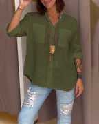 Camicia a tinta unita con tasche e bottoni semplici