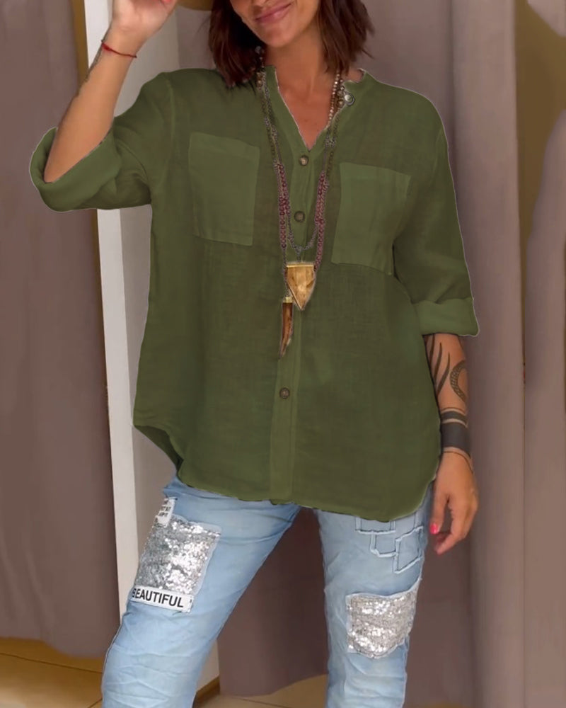 Camicia a tinta unita con tasche e bottoni semplici