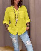 Camicia a tinta unita con tasche e bottoni semplici