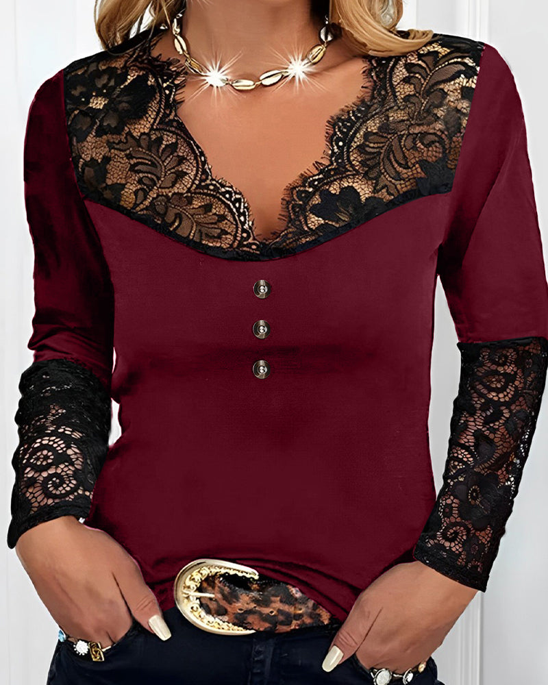 Top a maniche lunghe in pizzo con scollo a V