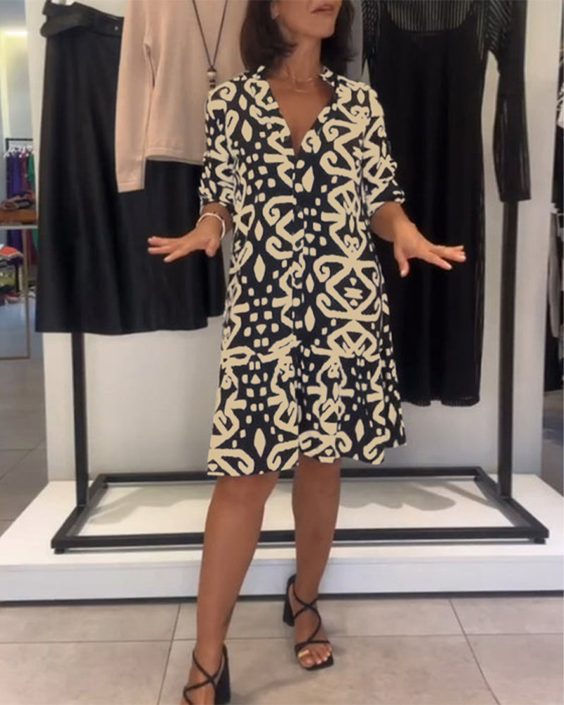 Abito elegante stampato con scollo a V
