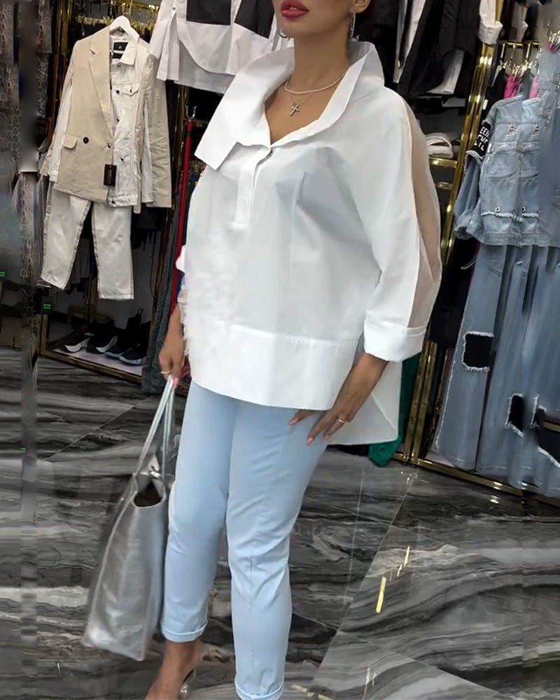 Camicetta floreale patchwork con risvolti in pizzo