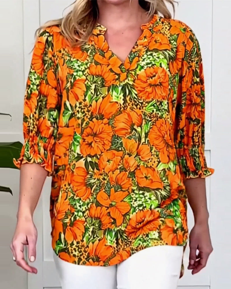 Blusa a maniche corte di tendenza floreale