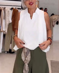 Blusa smanicata con scollo ampio