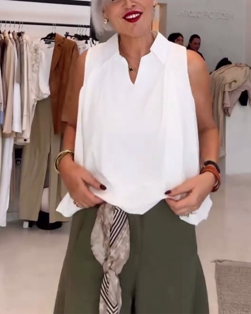 Blusa smanicata con scollo ampio
