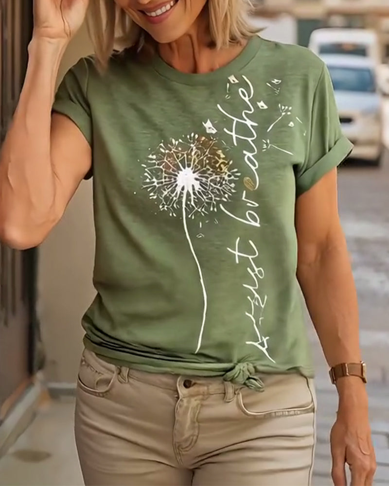 T-shirt a maniche corte stampato con dente di leone