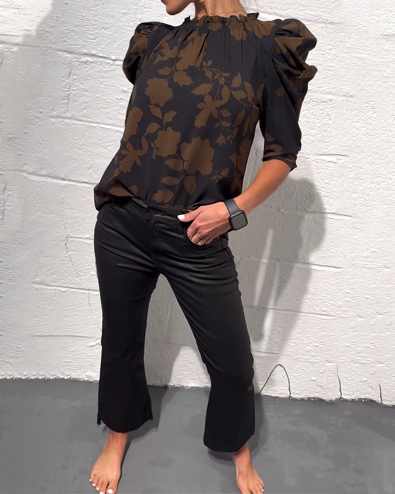 Camicia con maniche a sbuffo e volant