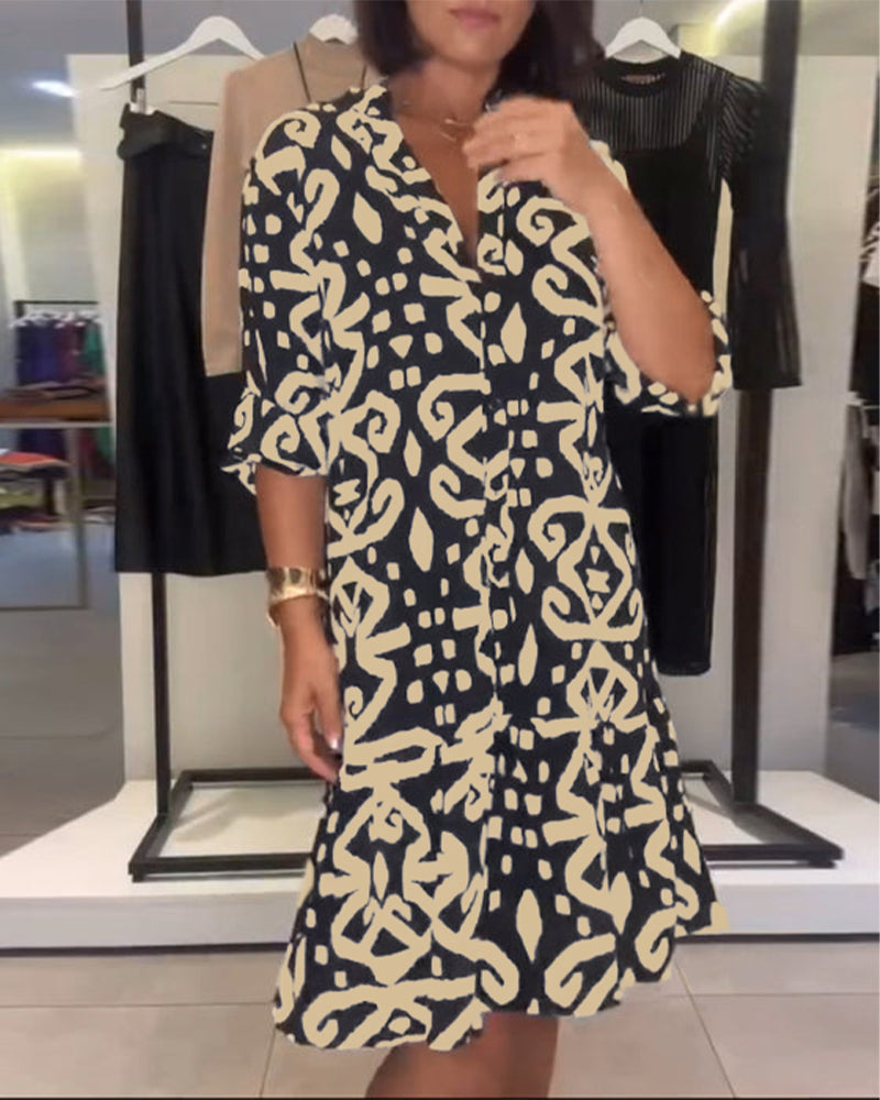 Abito elegante stampato con scollo a V