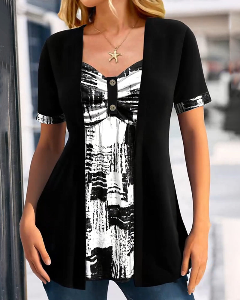 Blusa stampata finto due pezzi asimmetrica
