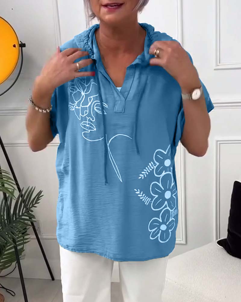 Blusa casual con cappuccio e maniche corte con stampa floreale