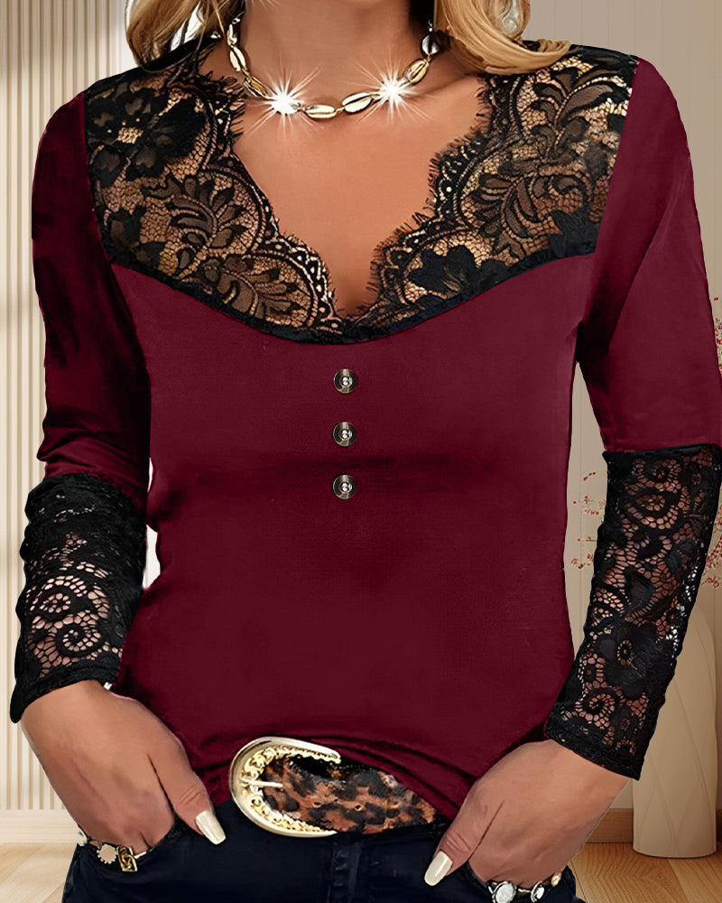 Top a maniche lunghe in pizzo con scollo a V