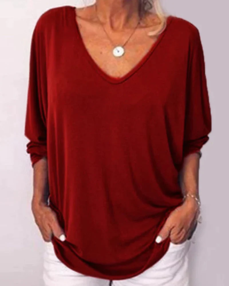 Top scollo a V abbottonato sul retro maniche a 3/4