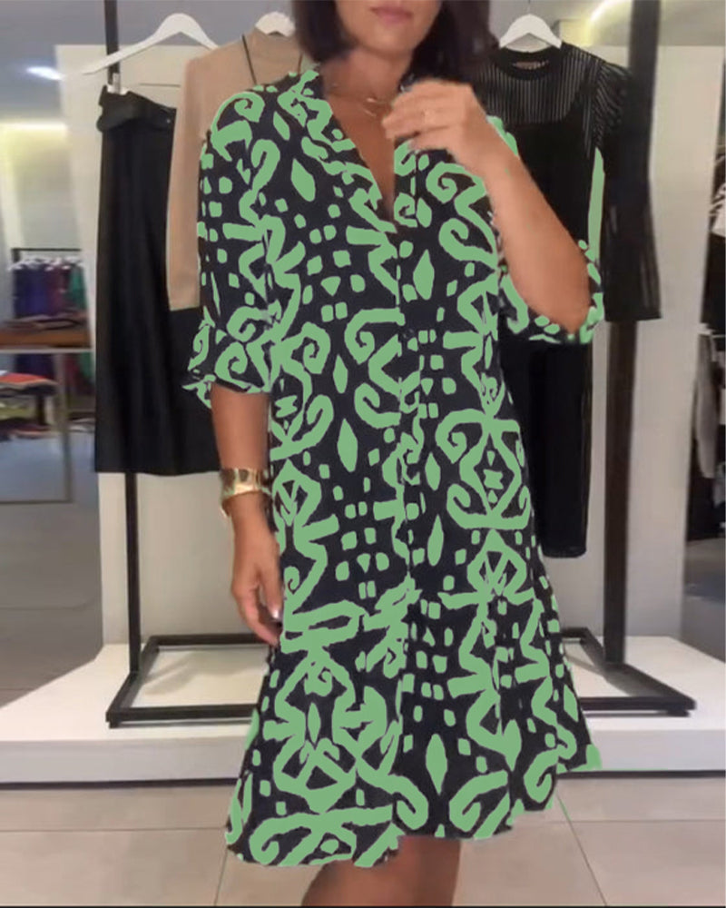 Abito elegante stampato con scollo a V