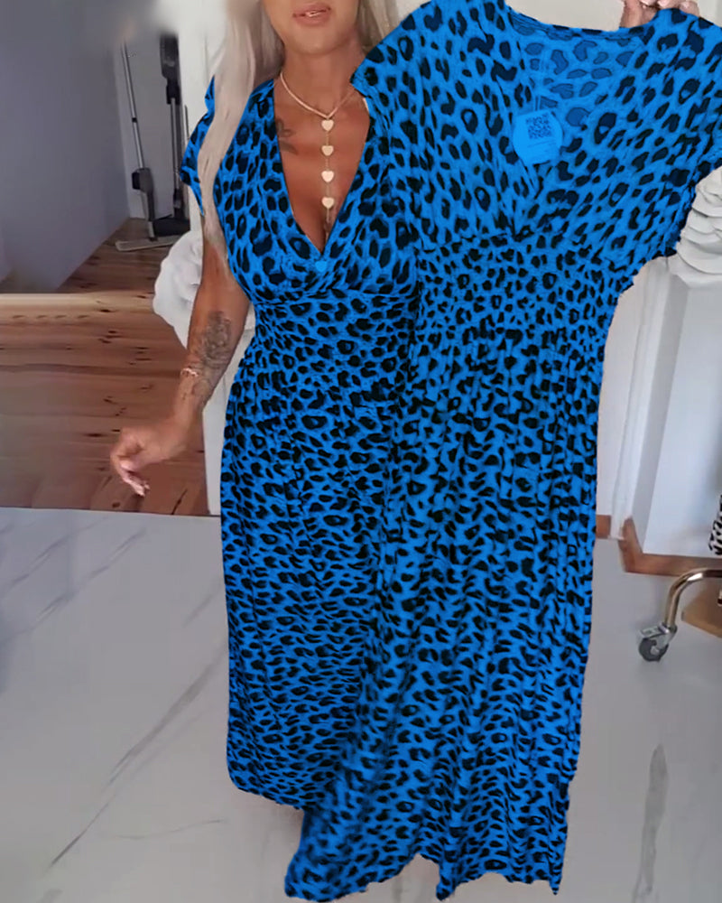 Elegante abito scollato a V con stampa leopardata