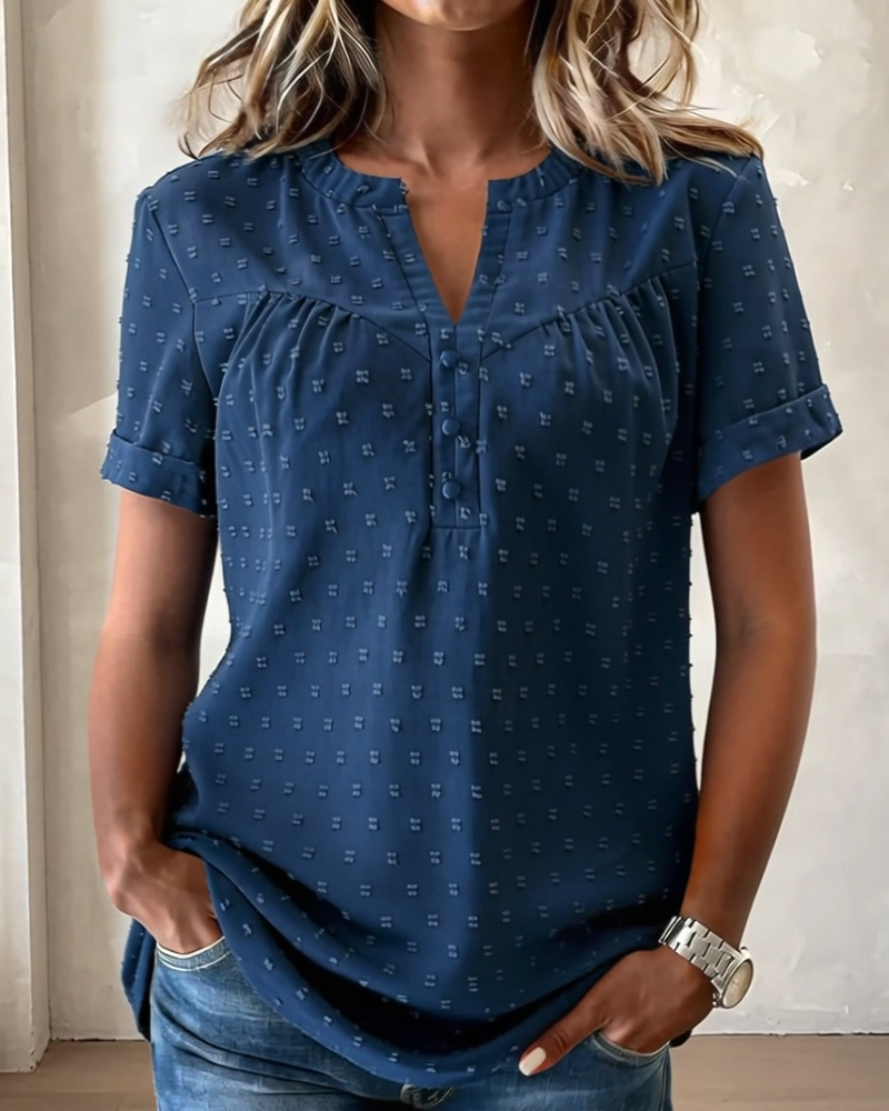 Camicetta jacquard con scollo a V, mezza abbottonatura e maniche corte