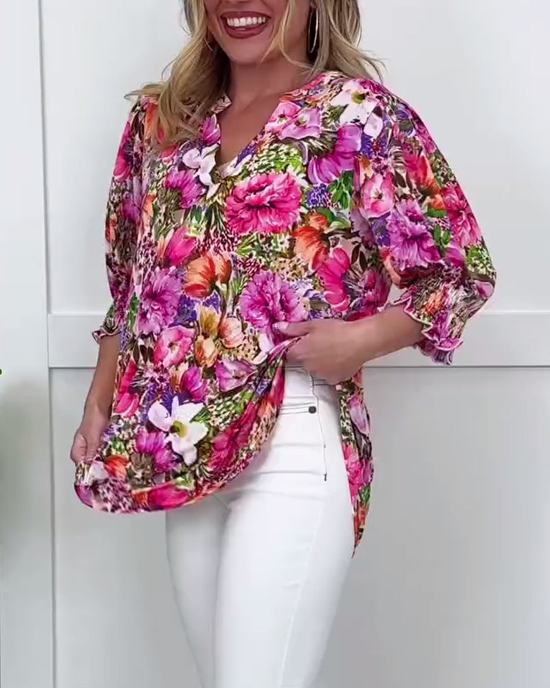 Blusa a maniche corte di tendenza floreale