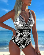 Costume intero con fiori e uccelli tropicali