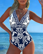 Costume intero con fiori e uccelli tropicali