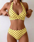 Bikini due pezzi a pois con scollo a fiocco