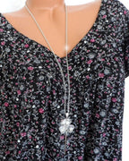 T-shirt ampio a maniche corte e scollo a V