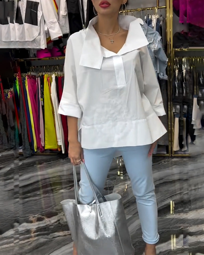 Camicetta floreale patchwork con risvolti in pizzo