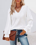 Top in pizzo a maniche lunghe con scollo a V
