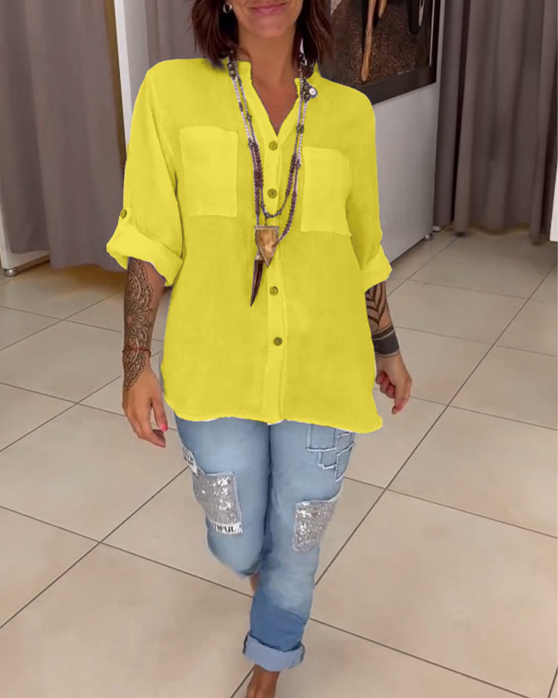 Camicia a tinta unita con tasche e bottoni semplici
