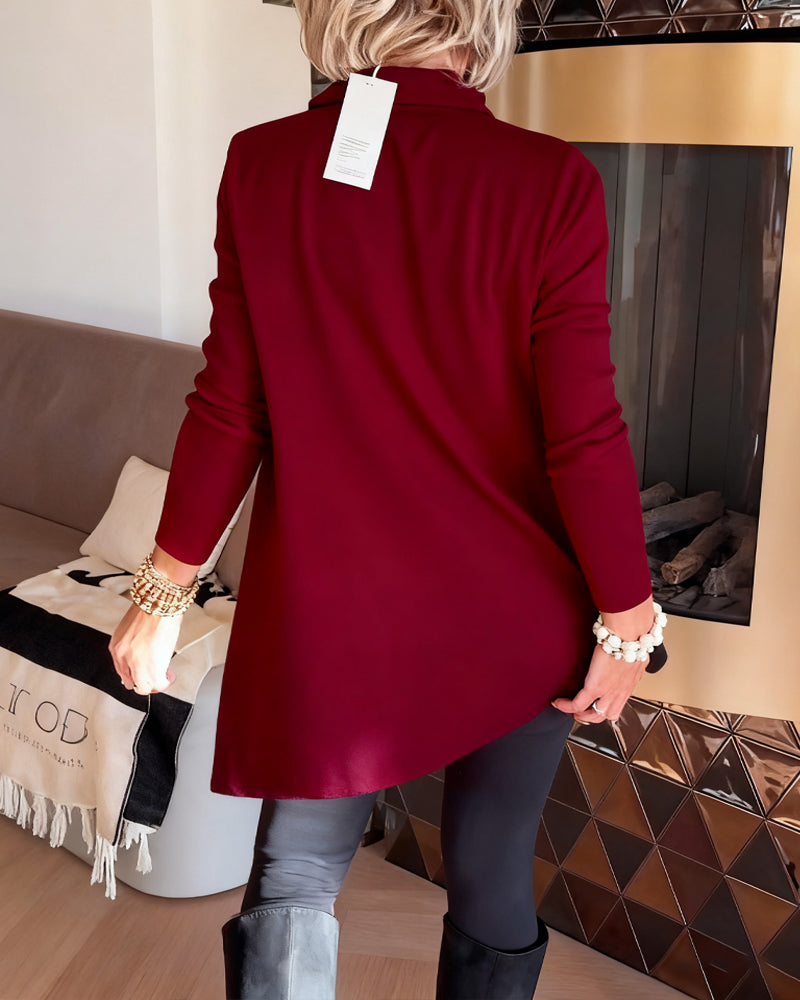 Top a collo asimmetrico a maniche lunghe