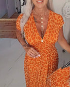 Elegante abito scollato a V con stampa leopardata