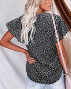 Camicia plissettata a maniche corte e scollo a V