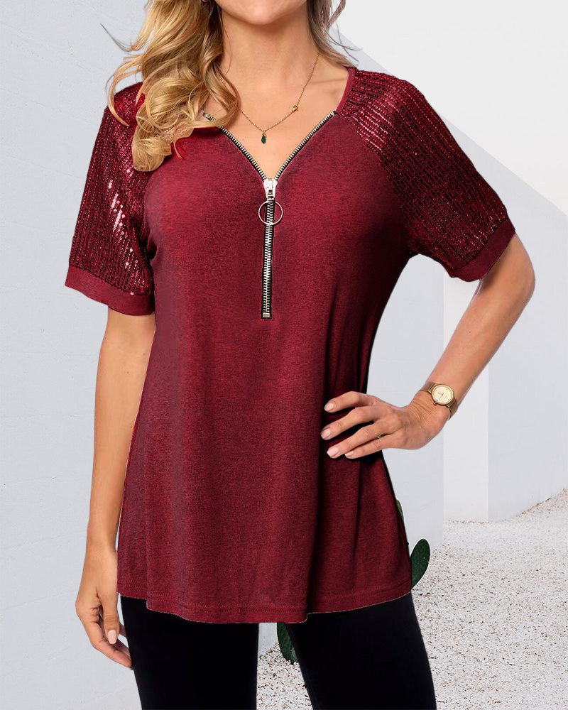 T-shirt con paillettes e maniche corte