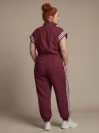 Lark | Tuta con zip e pannelli a righe