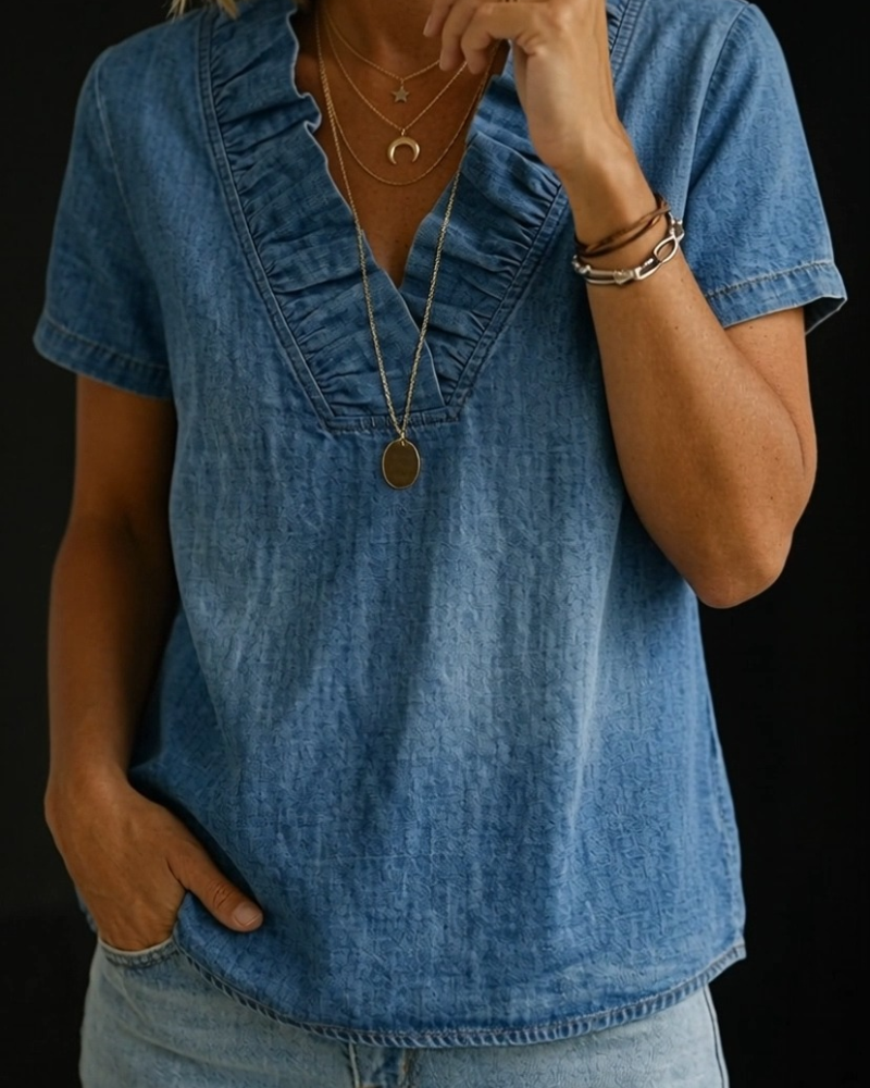 Camicetta svasata con scollo a V in denim
