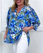 Blusa a maniche corte di tendenza floreale