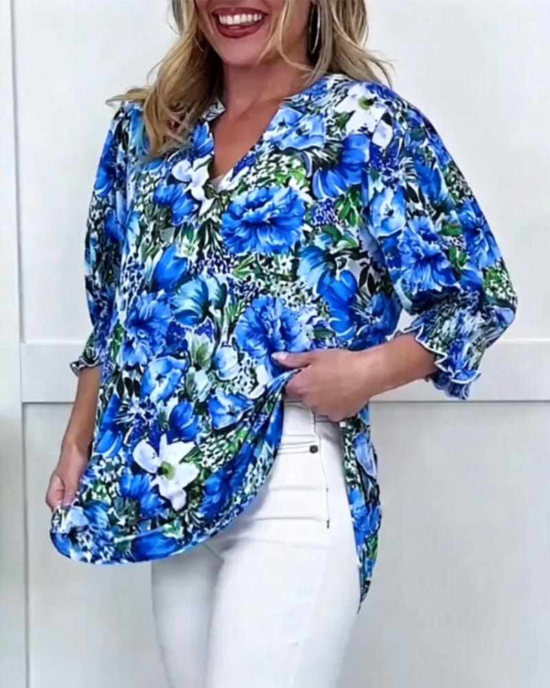 Blusa a maniche corte di tendenza floreale