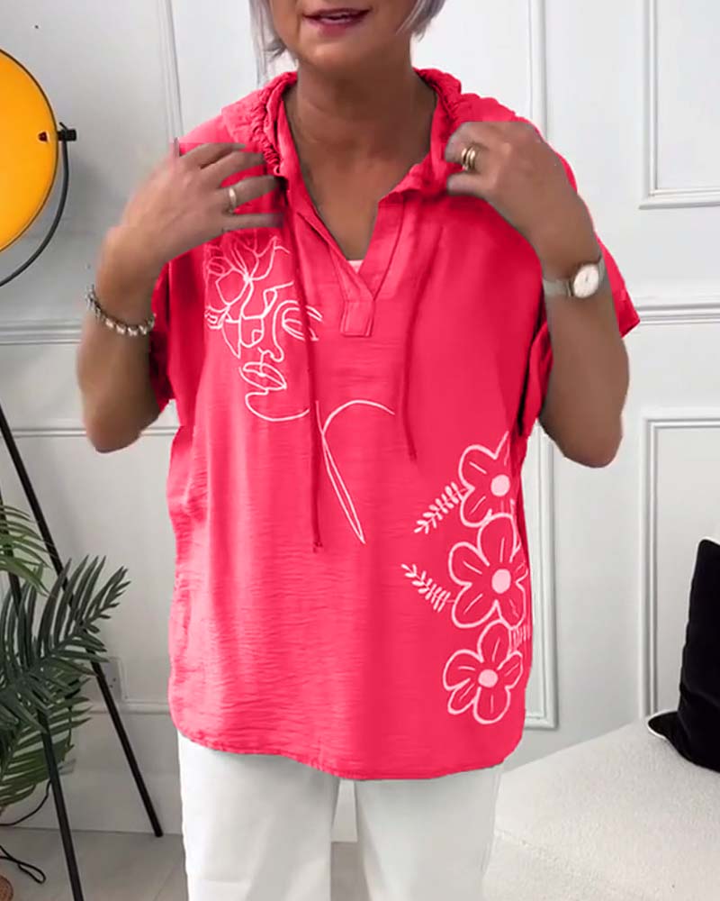 Blusa casual con cappuccio e maniche corte con stampa floreale