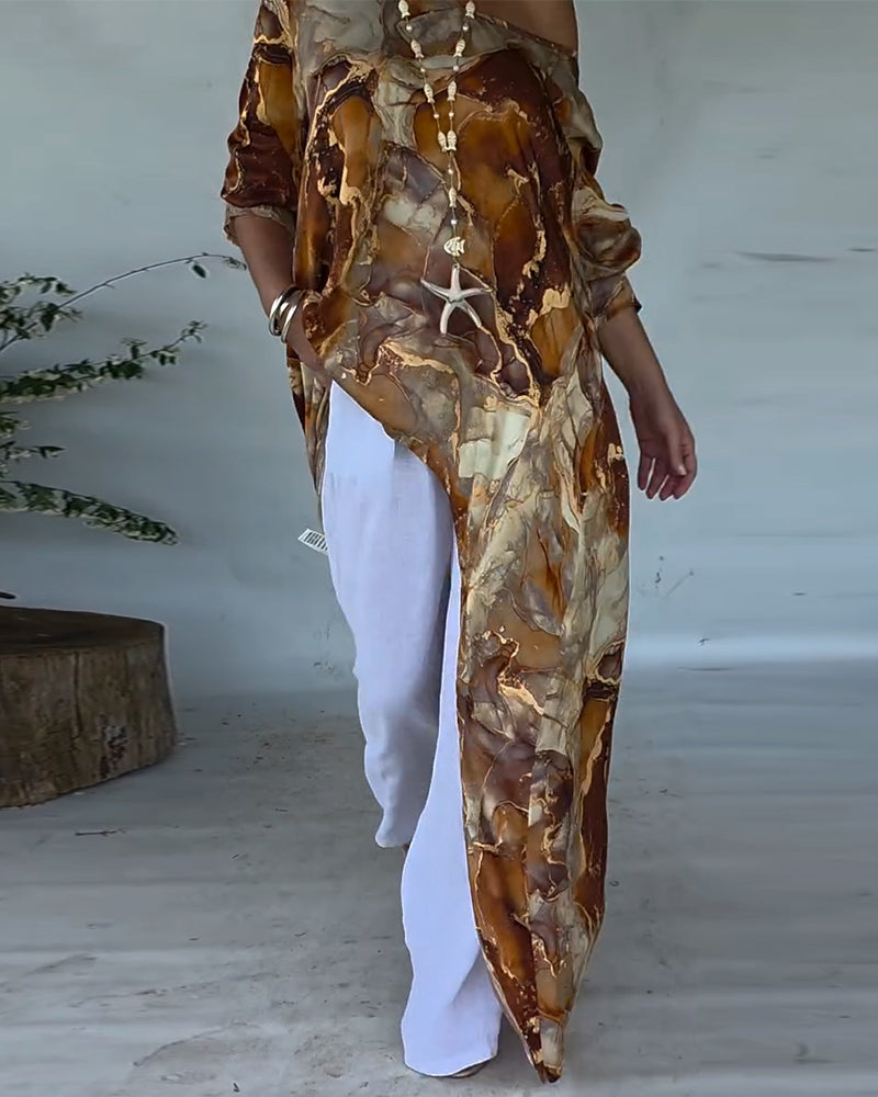 Camicetta stampata alla moda con spacco