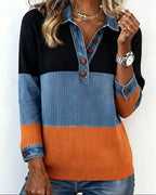 Top tendenza con revers e colore a contrasto