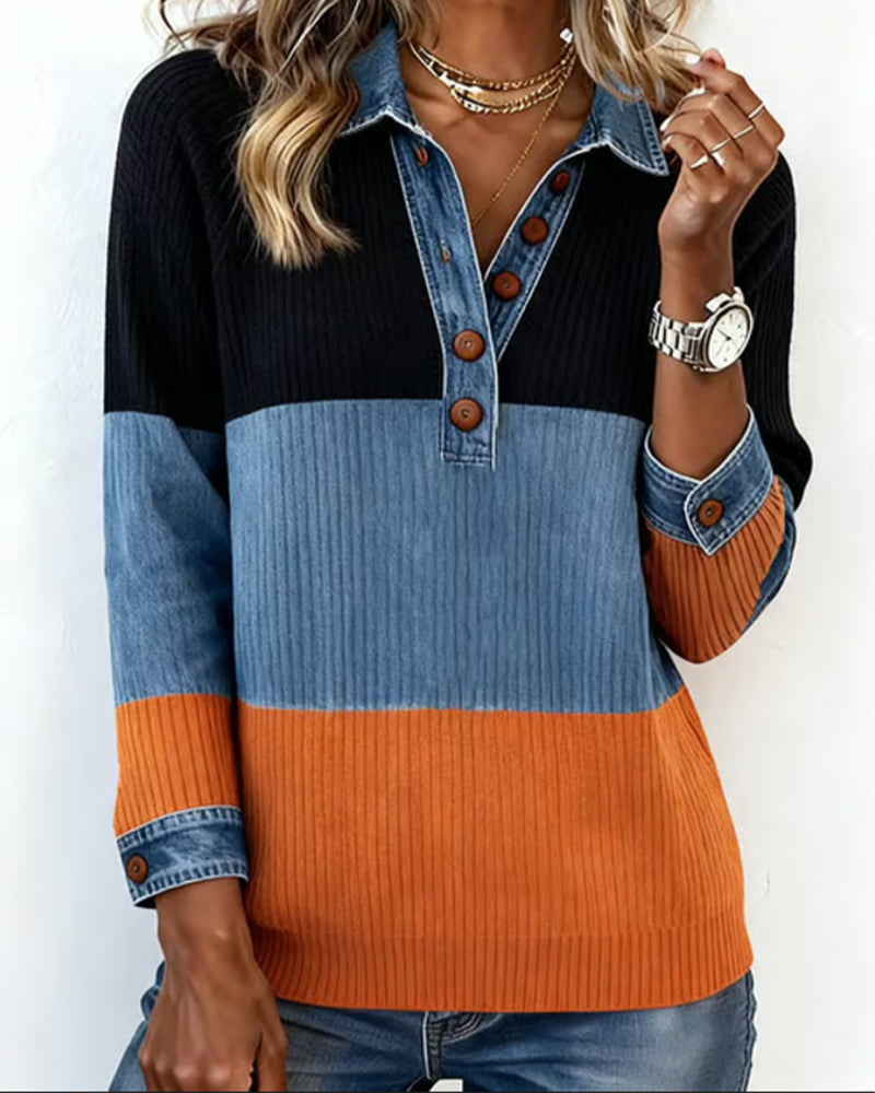 Top tendenza con revers e colore a contrasto