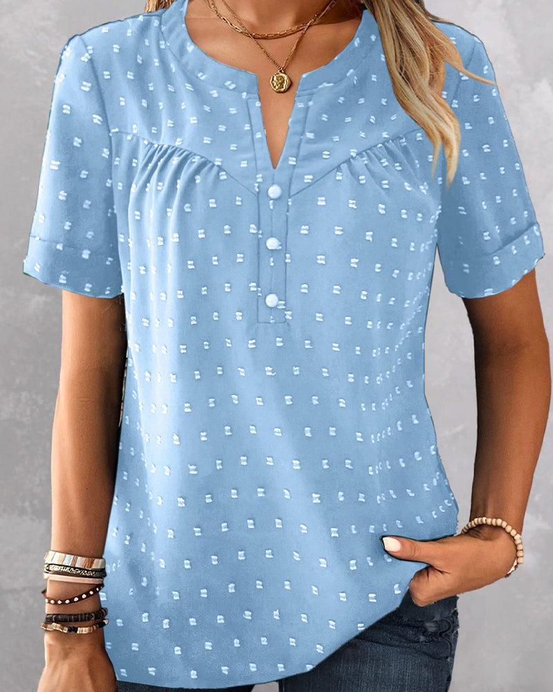 Camicetta jacquard con scollo a V, mezza abbottonatura e maniche corte