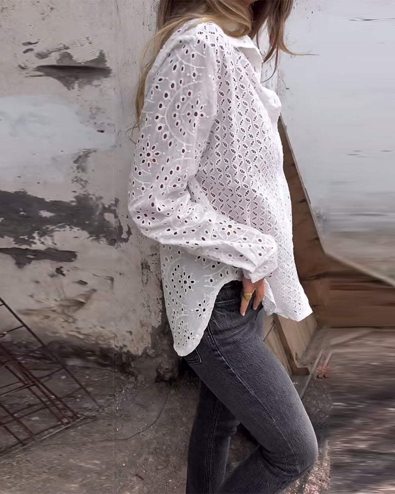 Camicia a maniche lunghe con risvolto tagliato