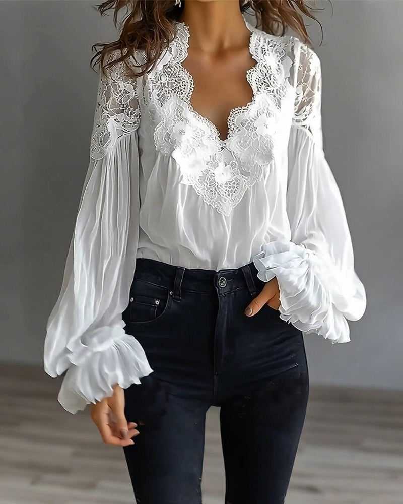 Camicetta in pizzo patchwork con scollo a V