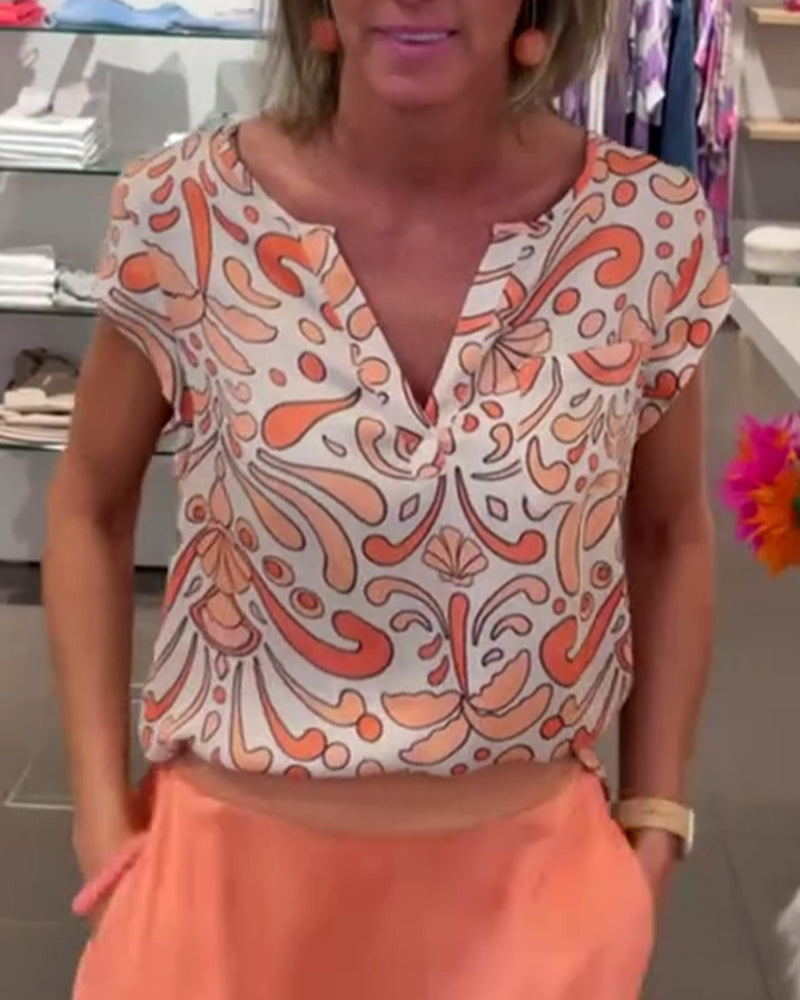 Camicetta casual stampata con scollo a V e maniche raglan