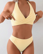 Costume da bagno due pezzi a righe con scollo a V