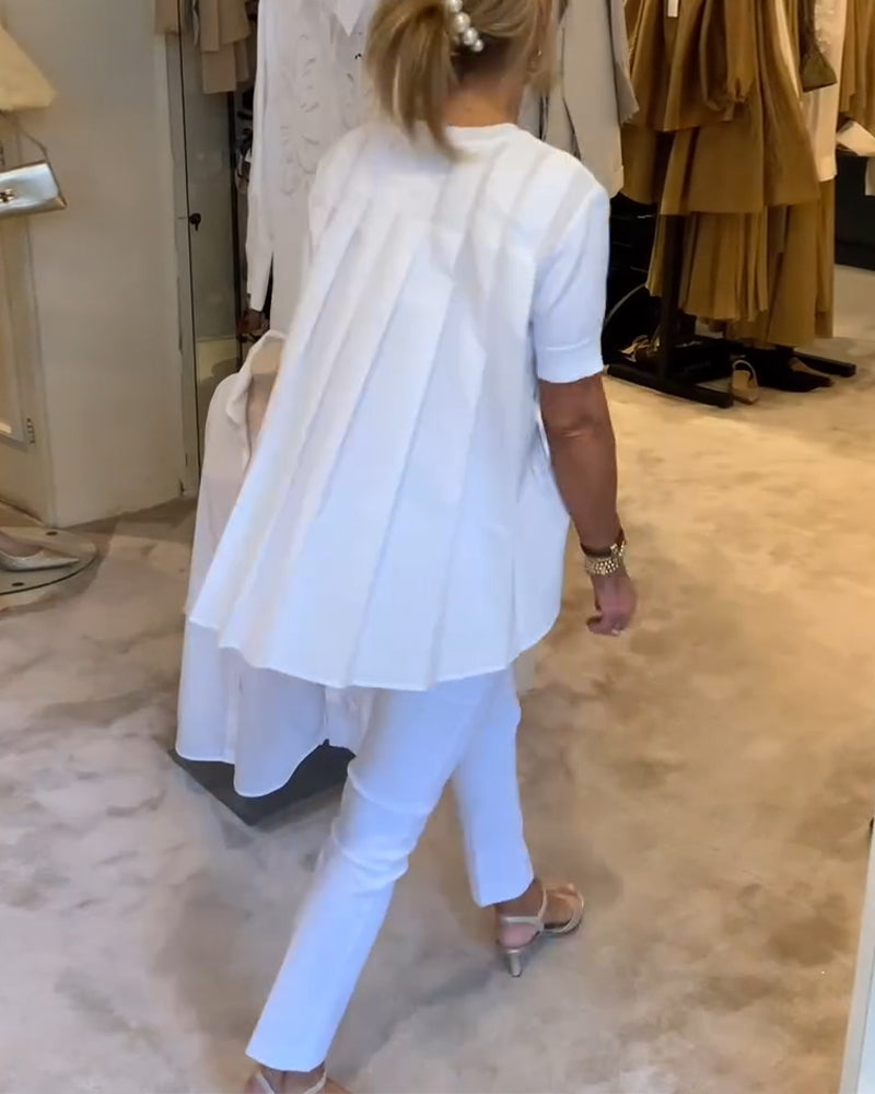Camicia plissettata a tinta unita ampia