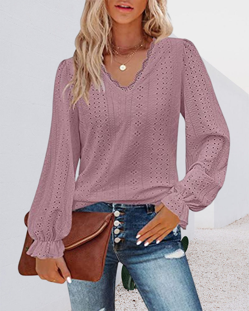 Top in pizzo a maniche lunghe con scollo a V
