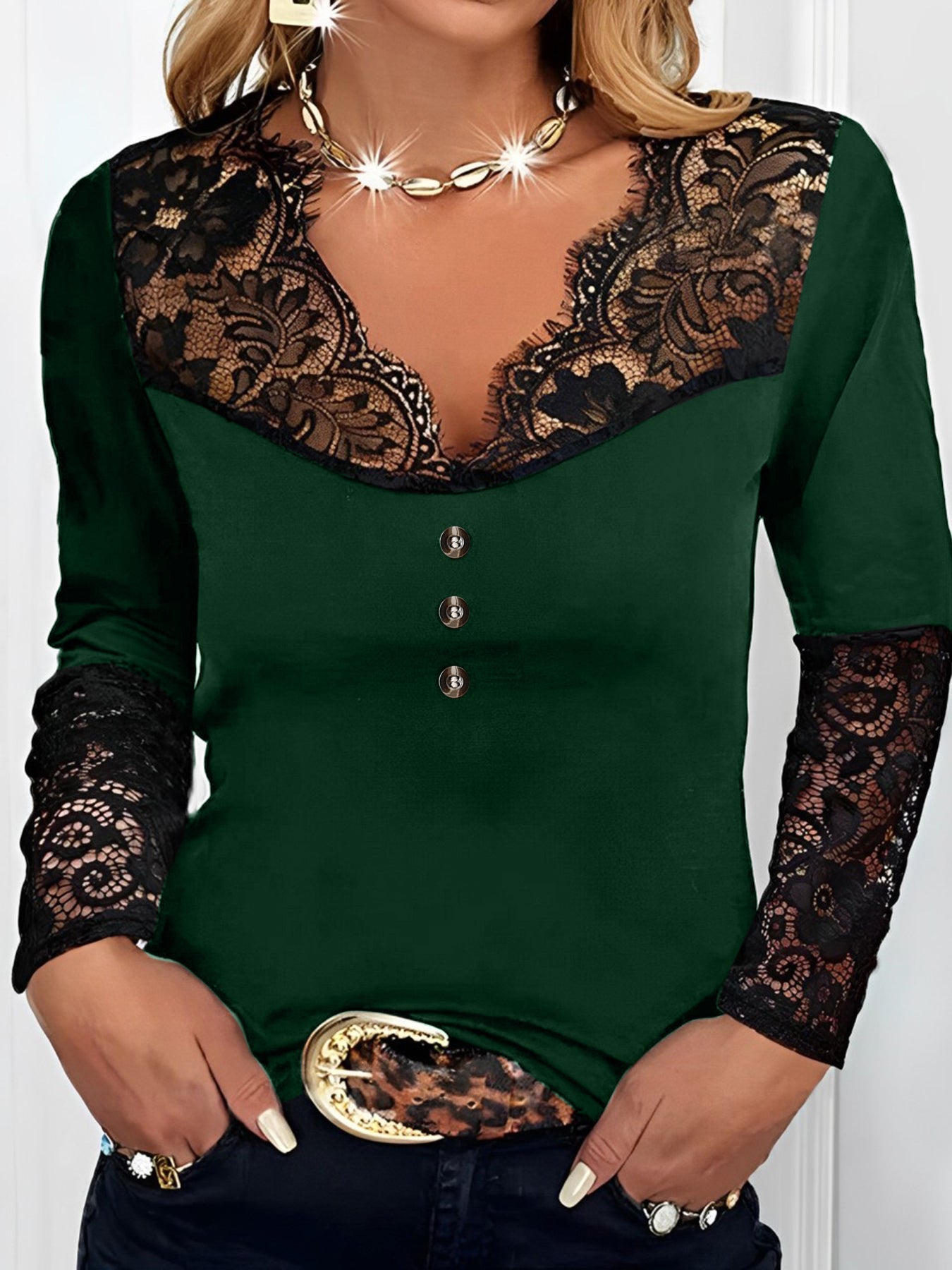 Top a maniche lunghe in pizzo con scollo a V
