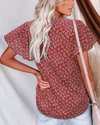 Camicia plissettata a maniche corte e scollo a V