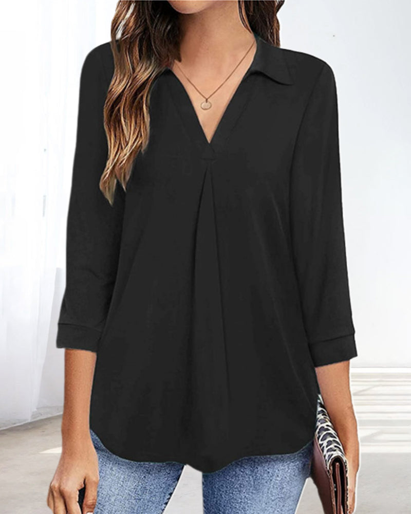 T-shirt a tinta unita con scollo a V